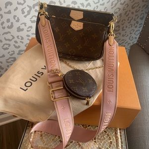 COPY - Authentic Louis Vuitton cross body with pink shoulder strap.